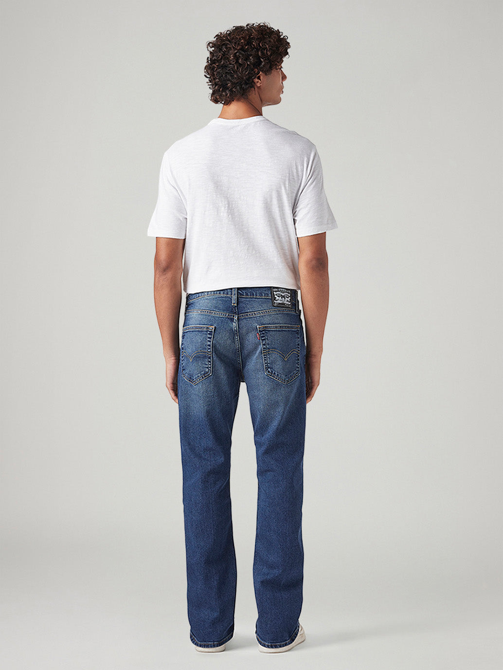 Men's 527 Med Indigo Bootcut Fit Mid Rise Tinted Jeans