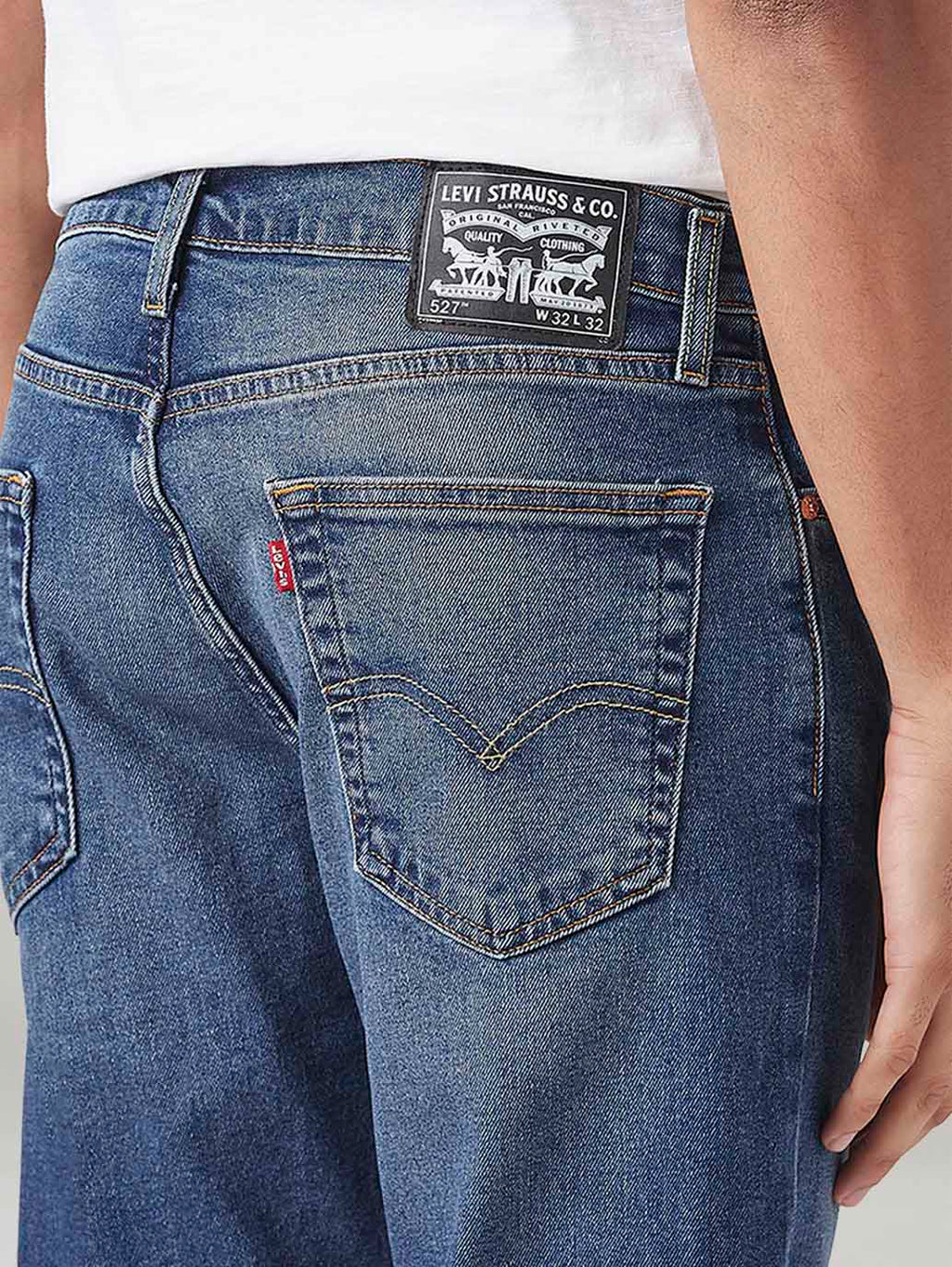 Men's 527 Med Indigo Bootcut Fit Mid Rise Tinted Jeans