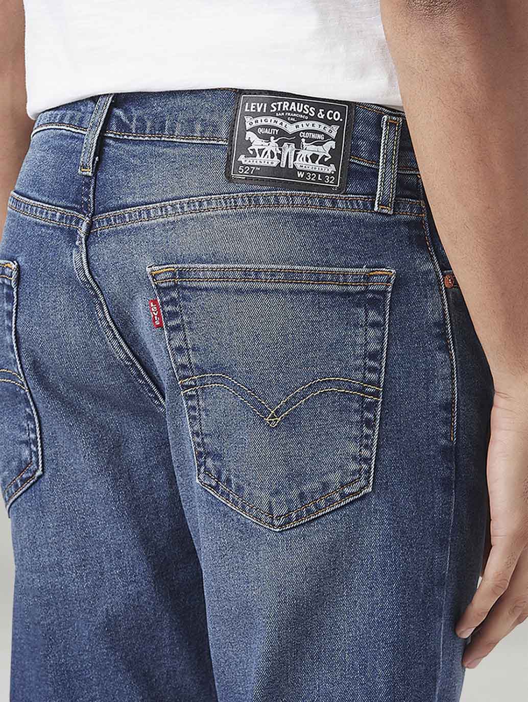 Men's 527 Med Indigo Bootcut Fit Mid Rise Tinted Jeans