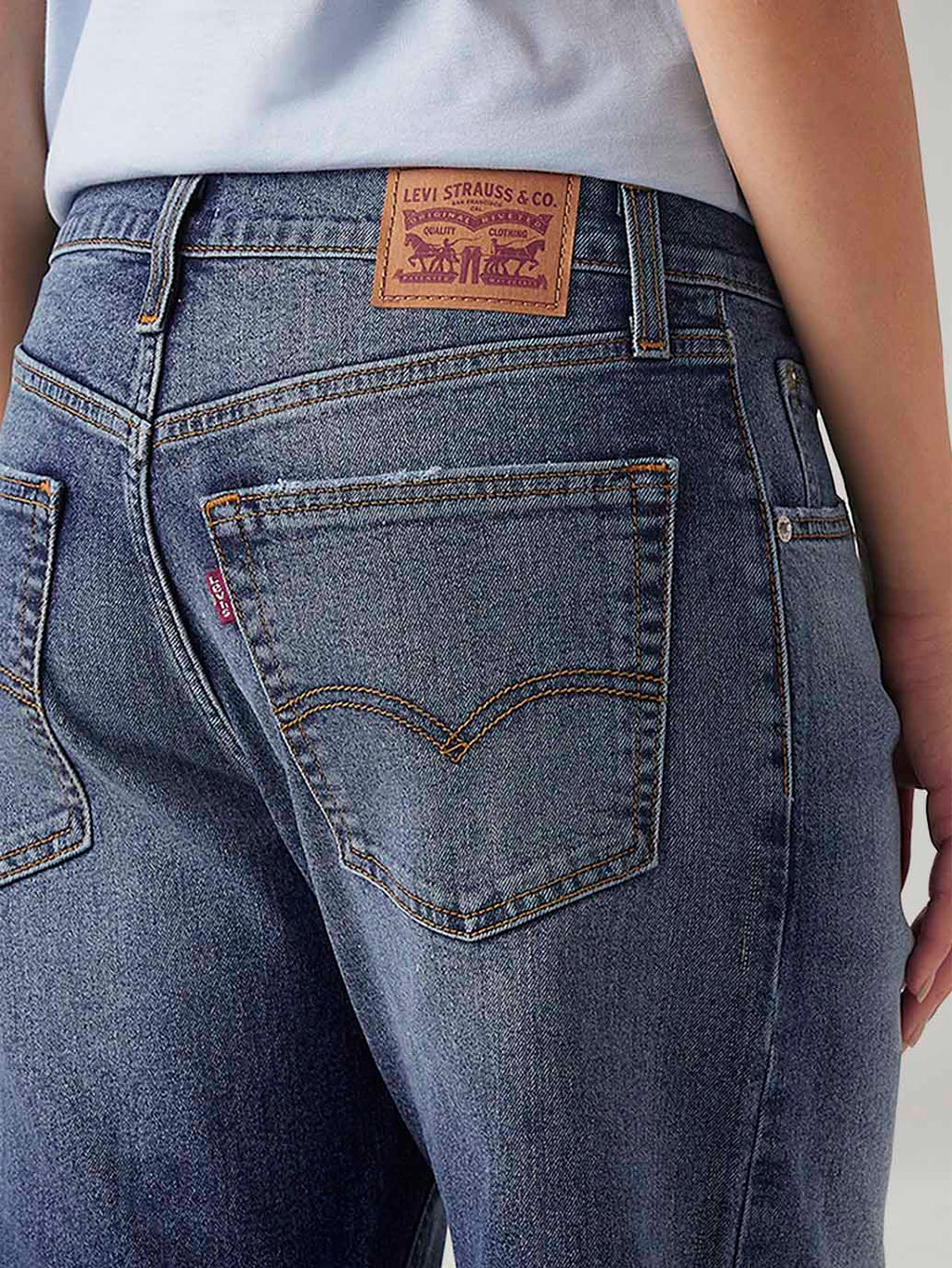 Women's Med Indigo Loose Bootcut Fit Mid Rise Jeans