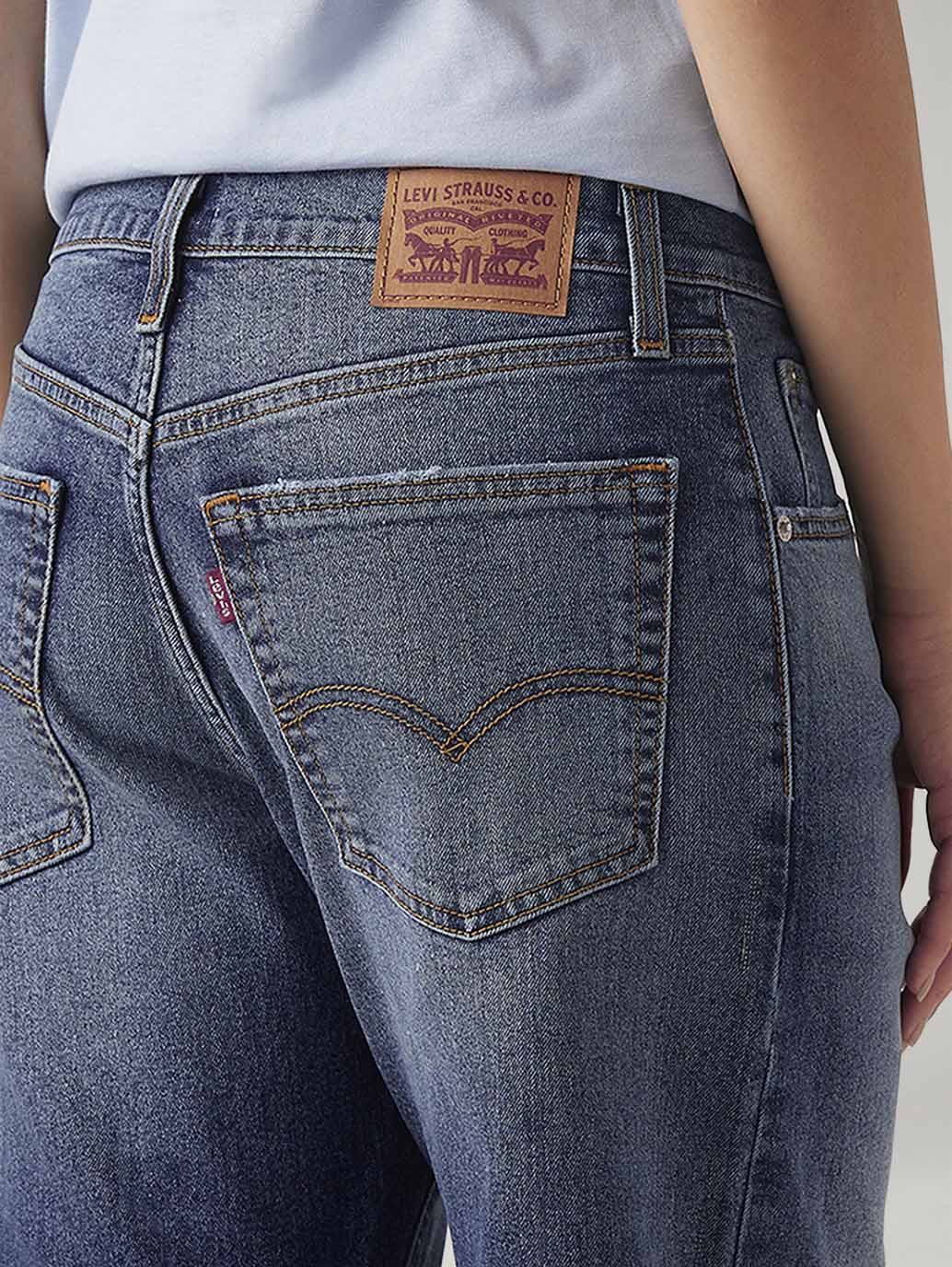 Women's Med Indigo Loose Bootcut Fit Mid Rise Jeans