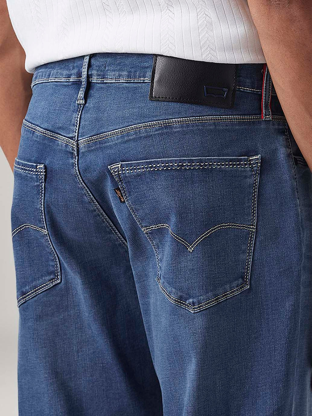 Men's 541 Blue Athletic Tapered Fit Mid Rise Redloop Jeans