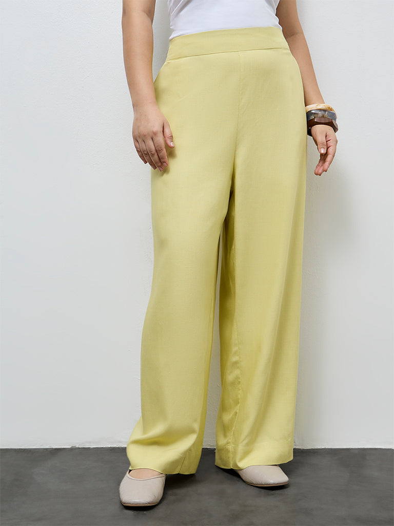 Gia Light Yellow Solid High-Rise Cotton-Blend Trousers