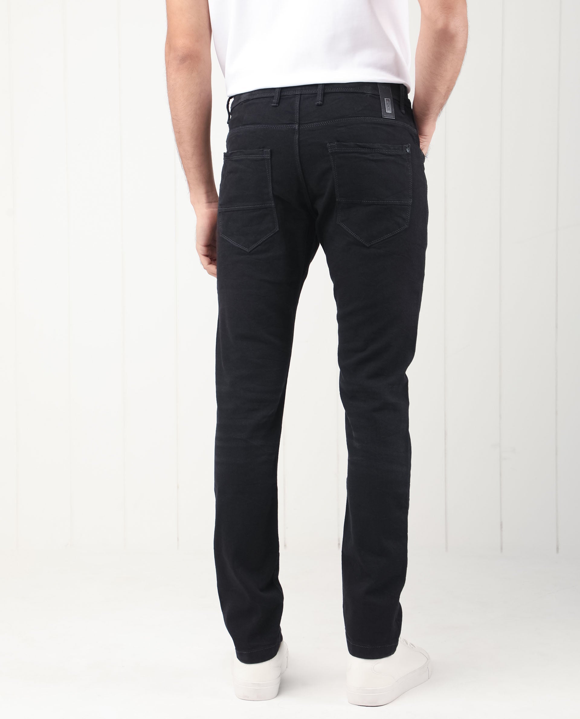Rare Rabbit Men's Benoit Black Cotton Plain Hawk Slim Fit Jeans