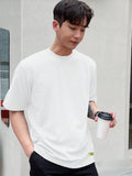 Men White Oversized Printed T-shirt