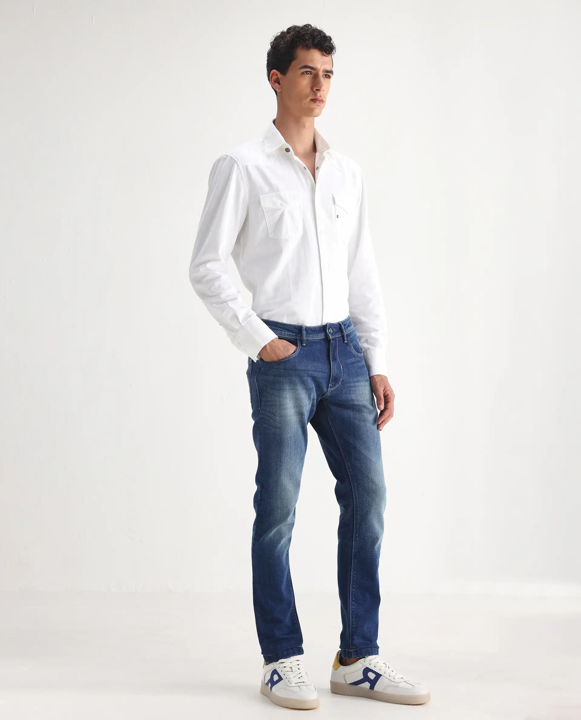 Rare Rabbit Men's Cyr Light Blue Cotton Plain Hawk Slim Fit Jeans