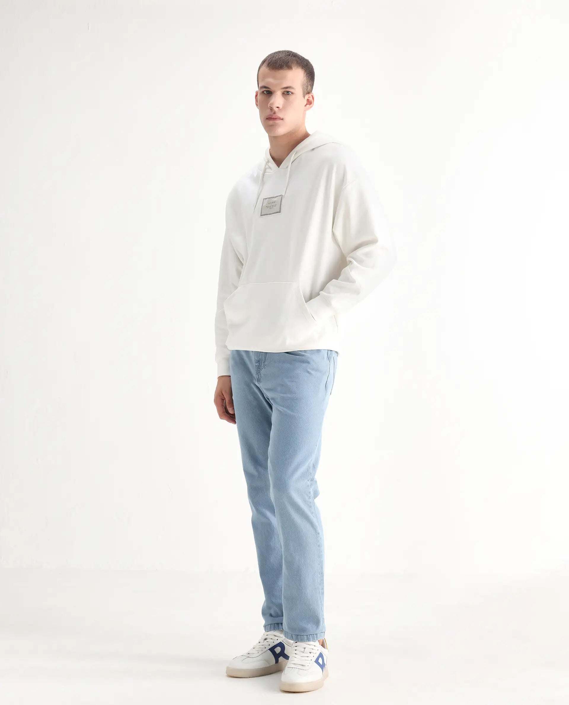 Rare Rabbit Men's Gleb Light Blue Cotton Plain Kurt Carrot Fit Jeans