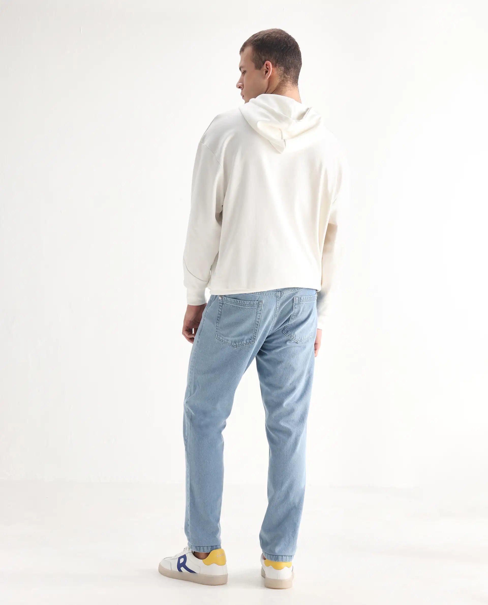 Rare Rabbit Men's Gleb Light Blue Cotton Plain Kurt Carrot Fit Jeans