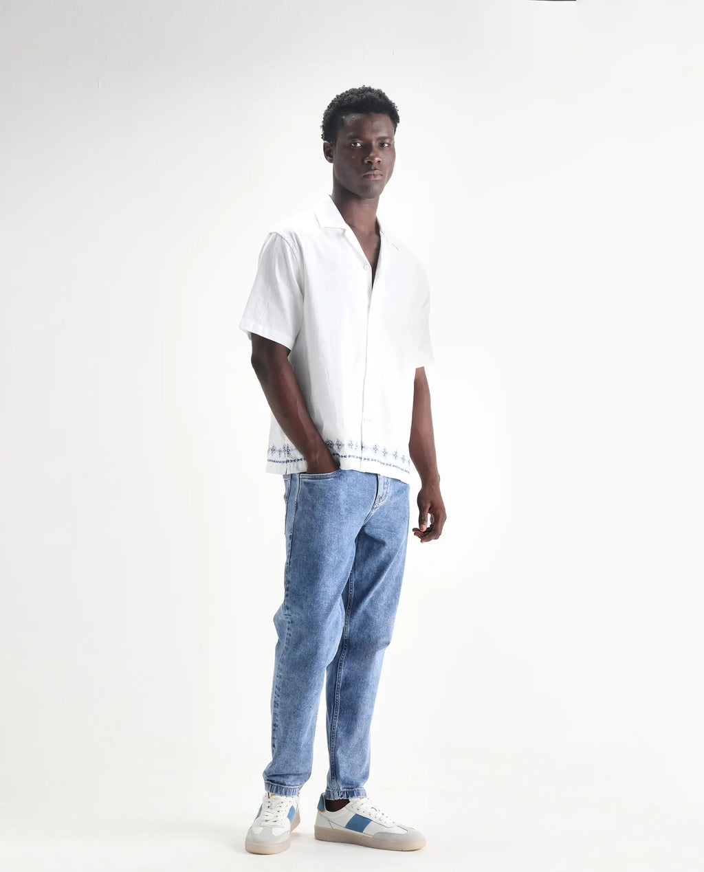 Rare Rabbit Men's Sam-2 Light Blue Cotton Plain Kurt Carrot Fit Jeans