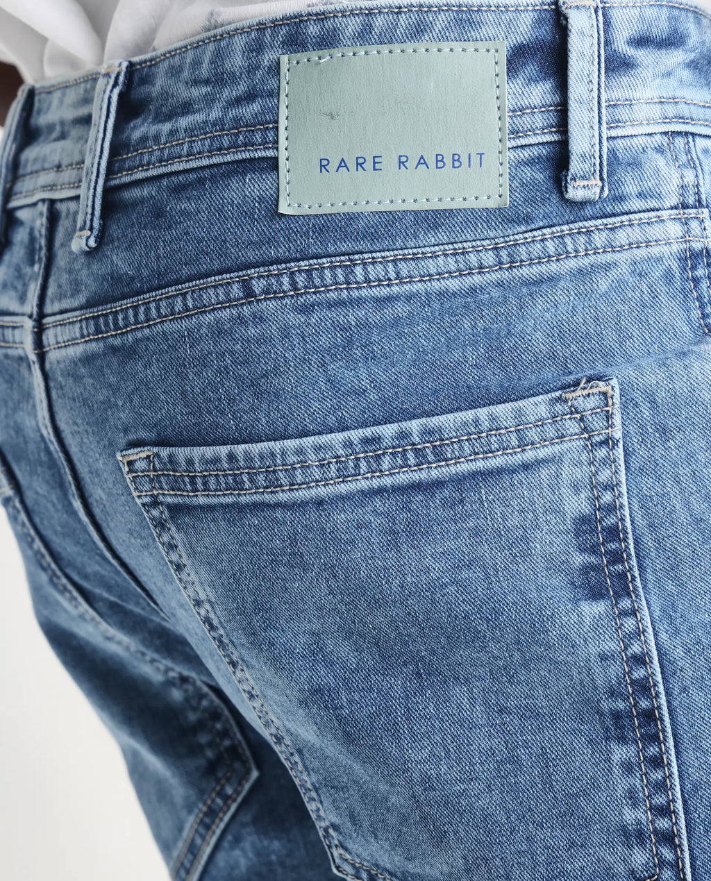 Rare Rabbit Men's Sam-2 Light Blue Cotton Plain Kurt Carrot Fit Jeans