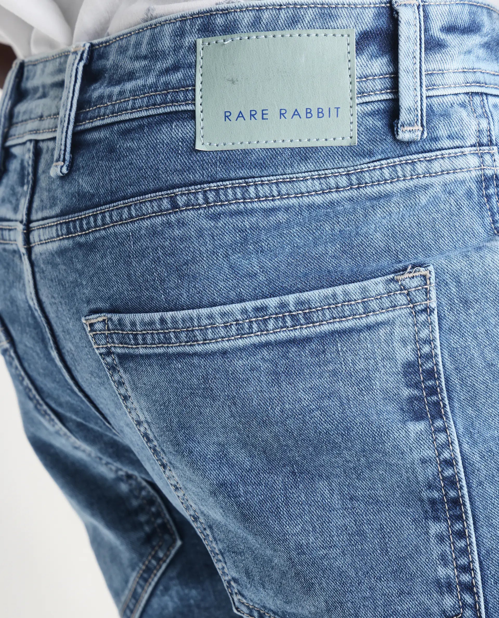 Rare Rabbit Men's Sam-2 Light Blue Cotton Plain Kurt Carrot Fit Jeans