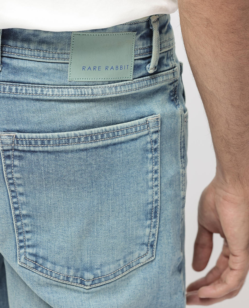 Rare Rabbit Men's Sam Pastel Blue Cotton Plain Kurt Carrot Fit Jeans