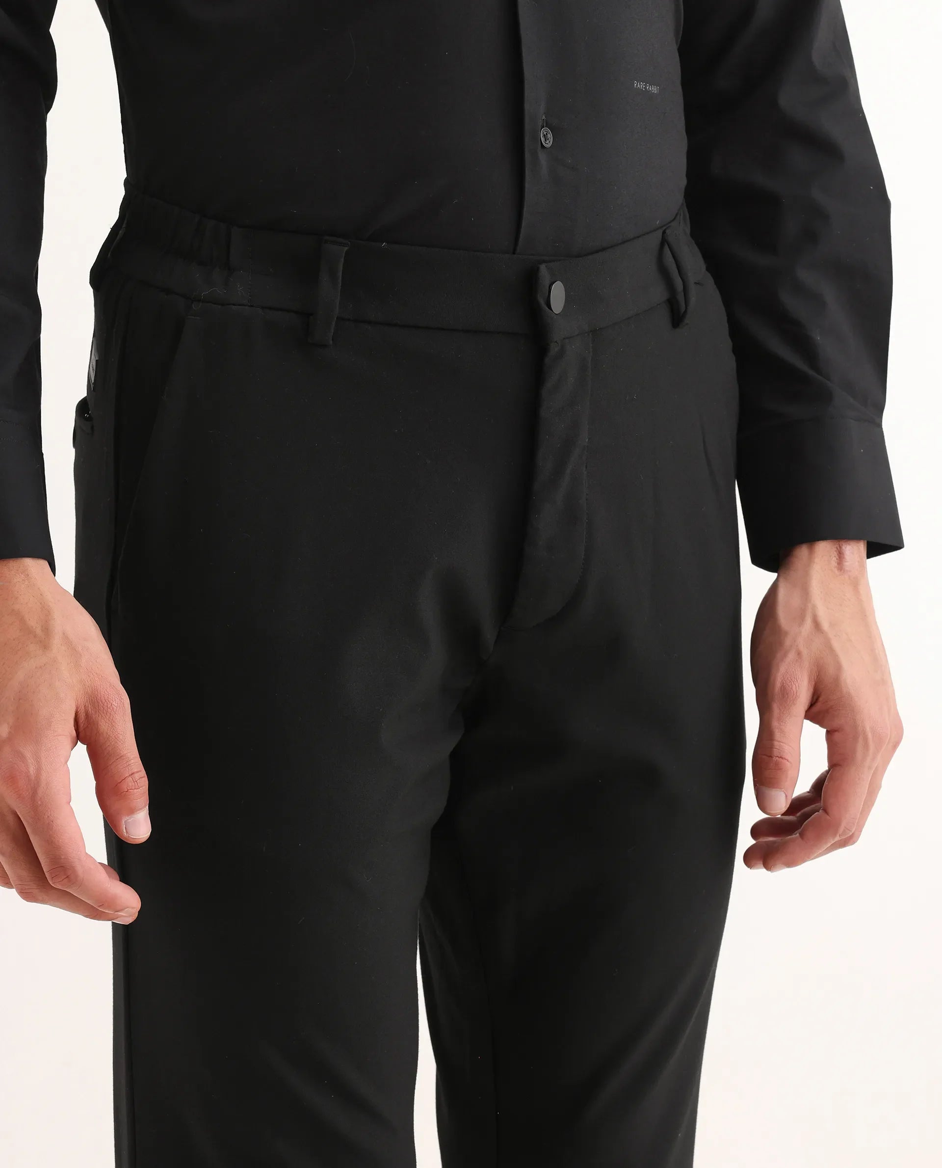 Rare Rabbit Men's Travel-11 Black Polyester Blend Plain Regular Fit Trouser