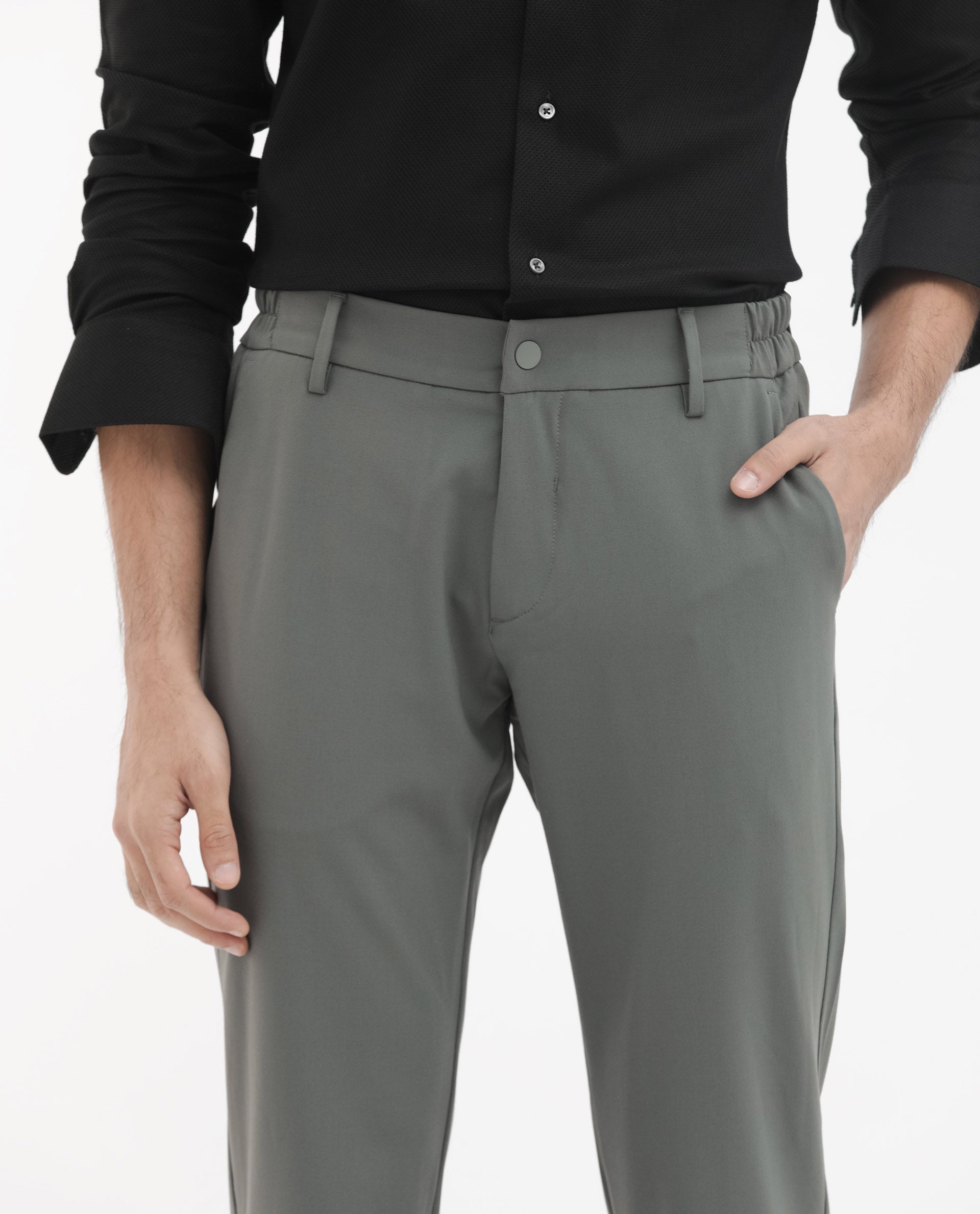 Rare Rabbit Men's Travel-24 Green Poly Viscose Lycra Fabric Blend Solid Trousers