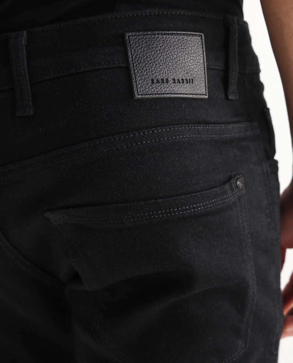 Rare Rabbit Men's Umo Black Cotton Blend Plain Hawk Slim Fit Jeans