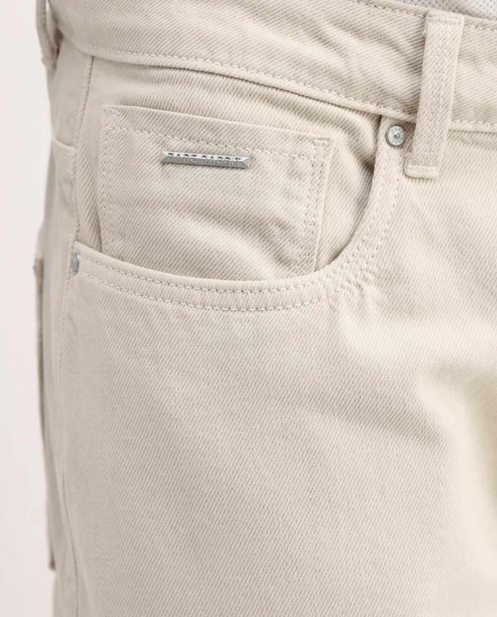 Rare Rabbit Men's Arvi-2 Light Beige Cotton Blend Plain Dond Carrot Fit Jeans