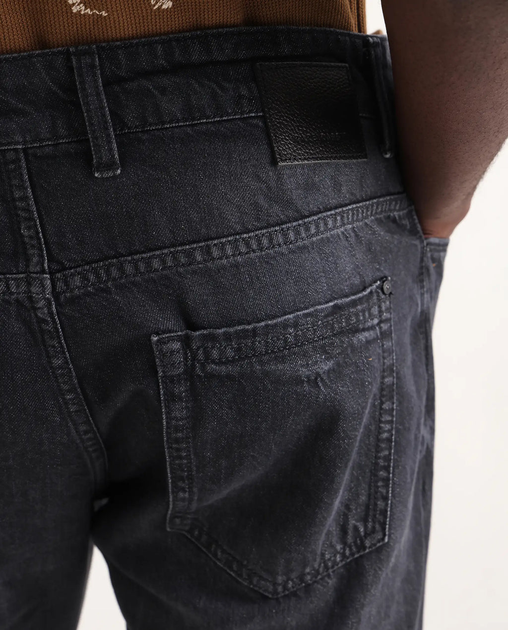 Rare Rabbit Men's Kairo-1 Black Cotton Plain Kurt Carrot Fit Jeans